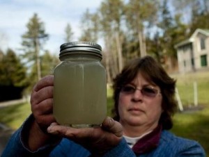 Carol French with jar of Water