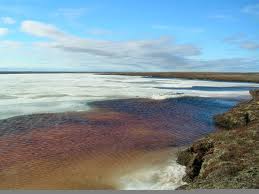 lake next to drilling rig